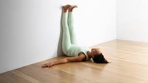 yoga for plantar fasciitis - Savasana with Feet Against Wall